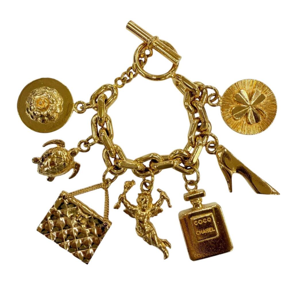 CHANEL Vintage Metal Icon Charm 7-Strand Bangle Bracelet, Gold, Weight 205g, ... - Picture 1 of 9